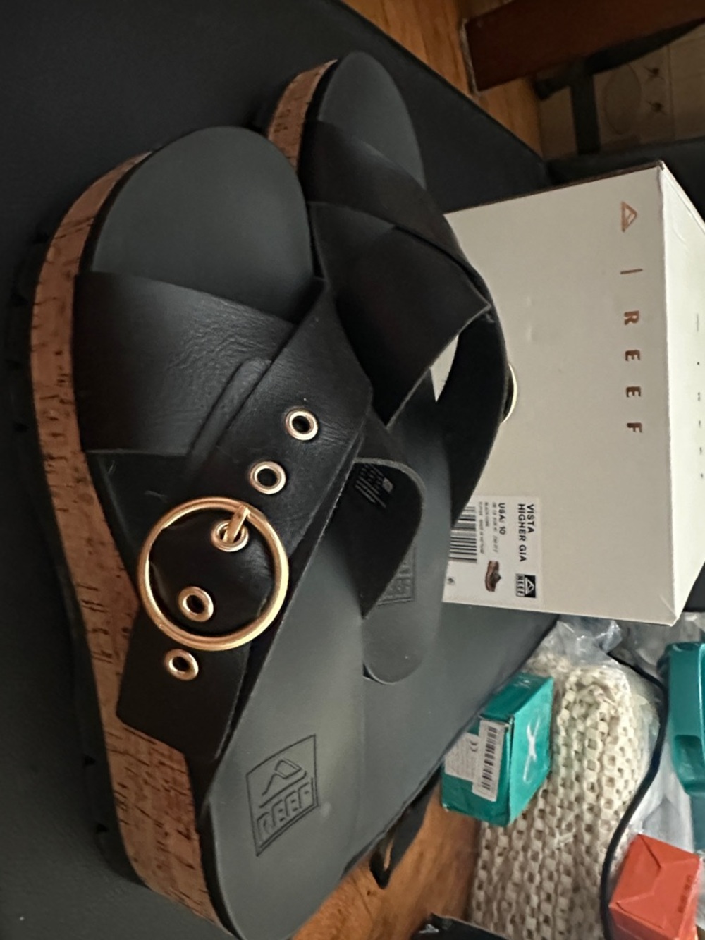 Reef Black Sandals with Gold Ring Accent